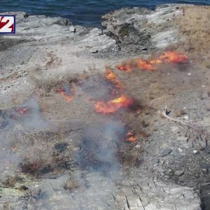 DEM conducts controlled fire on Dutch Island