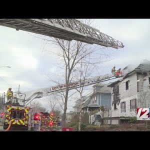 Flames tear through Cranston home