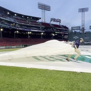 Video Now: Tarp removal at Fenway