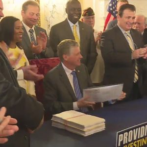 McKee signs $13.6B state budget