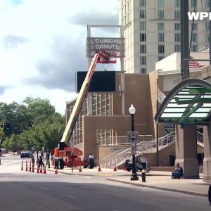 VIDEO NOW: Crews remove "Dunk" sign