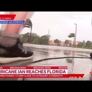 VIDEO NOW: Cameraman Drops Camera to Run to Help People Fleeing Hurricane Ian