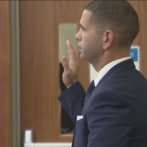 Providence police officer takes stand in assault trial